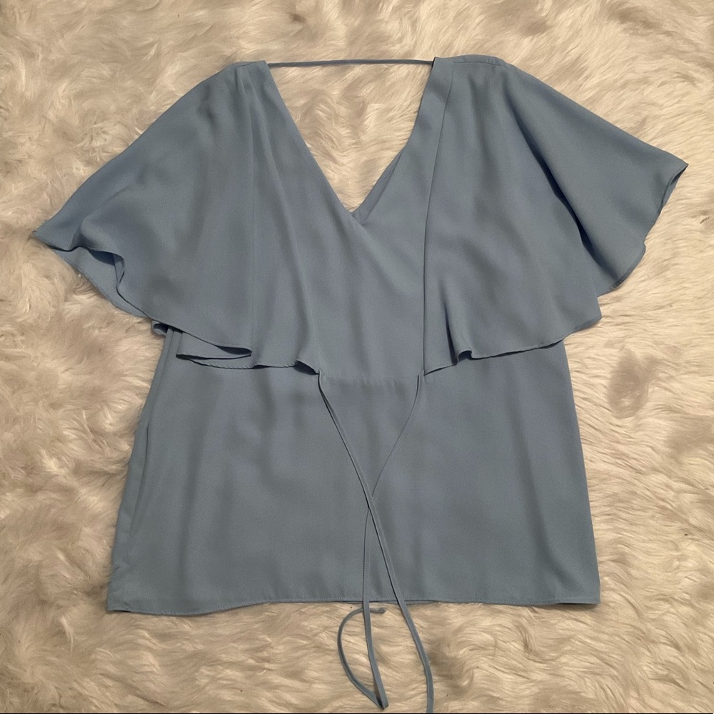 Light blue Bionco Nygord top size XL